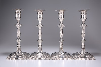 Lot 459 - A SET OF FOUR GEORGE II CAST SILVER CANDLESTICKS