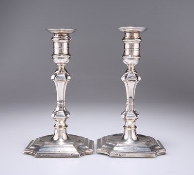 Lot 284 - A PAIR OF GEORGIAN STYLE SILVER CANDLESTICKS