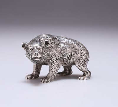 Lot 254 - AN EDWARDIAN CAST SILVER MODEL OF A BEAR