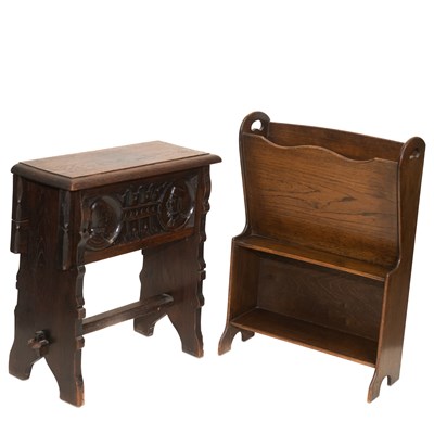 Lot 790 - A CARVED OAK BOX STOOL AND AN EARLY 20TH CENTURY OAK MAGAZINE RACK BOOKCASE