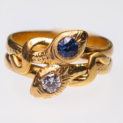 Lot 443 - A VICTORIAN STYLE SAPPHIRE AND DIAMOND SNAKE RING