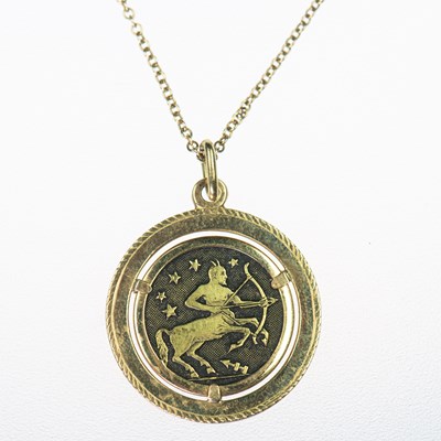 Lot 410 - A SAGITTARIUS PENDANT ON CHAIN