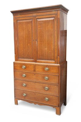 Lot 779 - A 19TH CENTURY OAK PRESS CUPBOARD