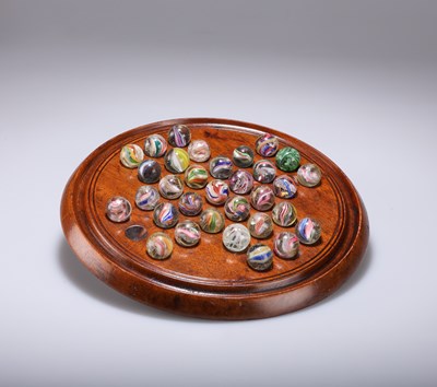 Lot 51 - TREEN: A LATE VICTORIAN MAHOGANY SOLITAIRE BOARD AND MARBLES