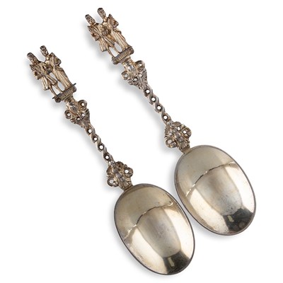 Lot 1113 - A PAIR OF VICTORIAN SILVER-GILT DECORATIVE SERVING SPOONS