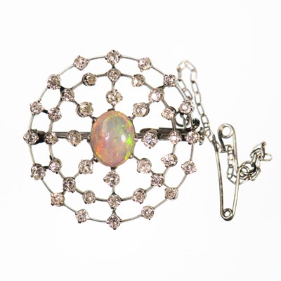 Lot 580 - AN EARLY 20TH CENTURY OPAL AND DIAMOND BROOCH