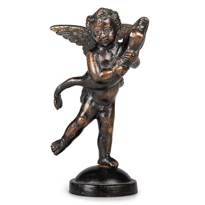 Lot 1086 - A PATINATED BRONZE MODEL OF A PUTTO WITH A DOLPHIN