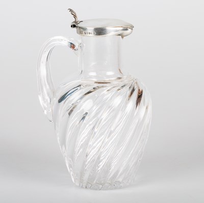 Lot 273 - A VICTORIAN SILVER-MOUNTED CLARET JUG