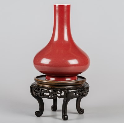 Lot 97 - A CHINESE SANG DE BOEUF BOTTLE VASE, QING DYNASTY