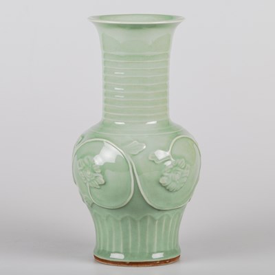 Lot 1069 - A CHINESE YUAN/MING STYLE MOULDED CELADON VASE