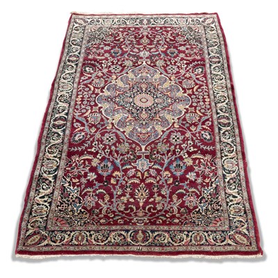 Lot 673 - A PERSIAN MASHAD RUG