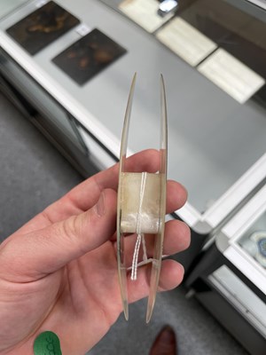 Lot 448 - A 19TH CENTURY MOTHER-OF-PEARL TATTING SHUTTLE