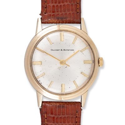 Lot 521 - A GENTS 9CT GOLD OLIVANT & BOTSFORD STRAP WATCH