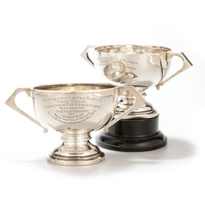 Lot 473 - TWO GEORGE V SILVER TWO-HANDLED TROPHY CUPS