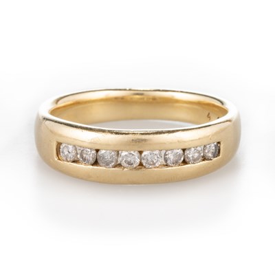 Lot 510 - A DIAMOND HALF HOOP RING