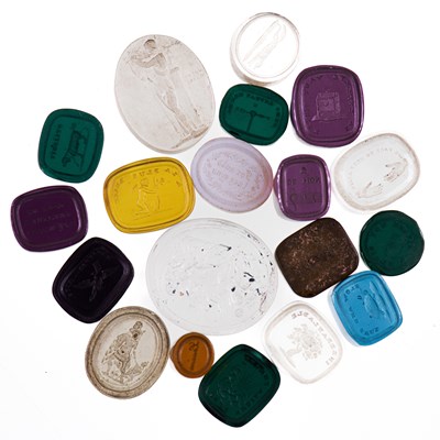 Lot 509 - NINETEEN VARIOUS 19TH CENTURY CLEAR AND COLOURED PASTE INTAGLIO SEALS