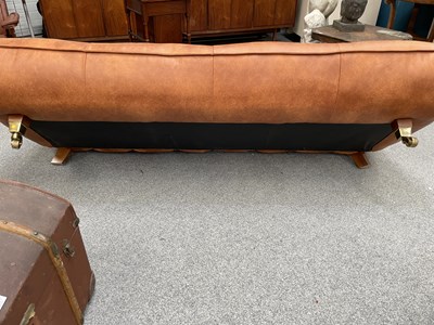 Lot 701 - A CONTEMPORARY TAN LEATHER SOFA