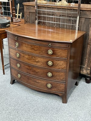 Lot 666 - A GEORGE III MAHOGANY BOW-FRONT CHEST OF DRAWERS, CIRCA 1800