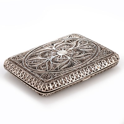 Lot 330 - A CONTINENTAL FILIGREE WHITE METAL CIGARETTE CASE