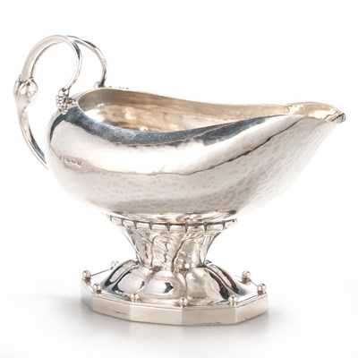 Lot 278 - GEORG JENSEN: A DANISH SILVER LEAF AND BERRIES PATTERN SAUCE BOAT