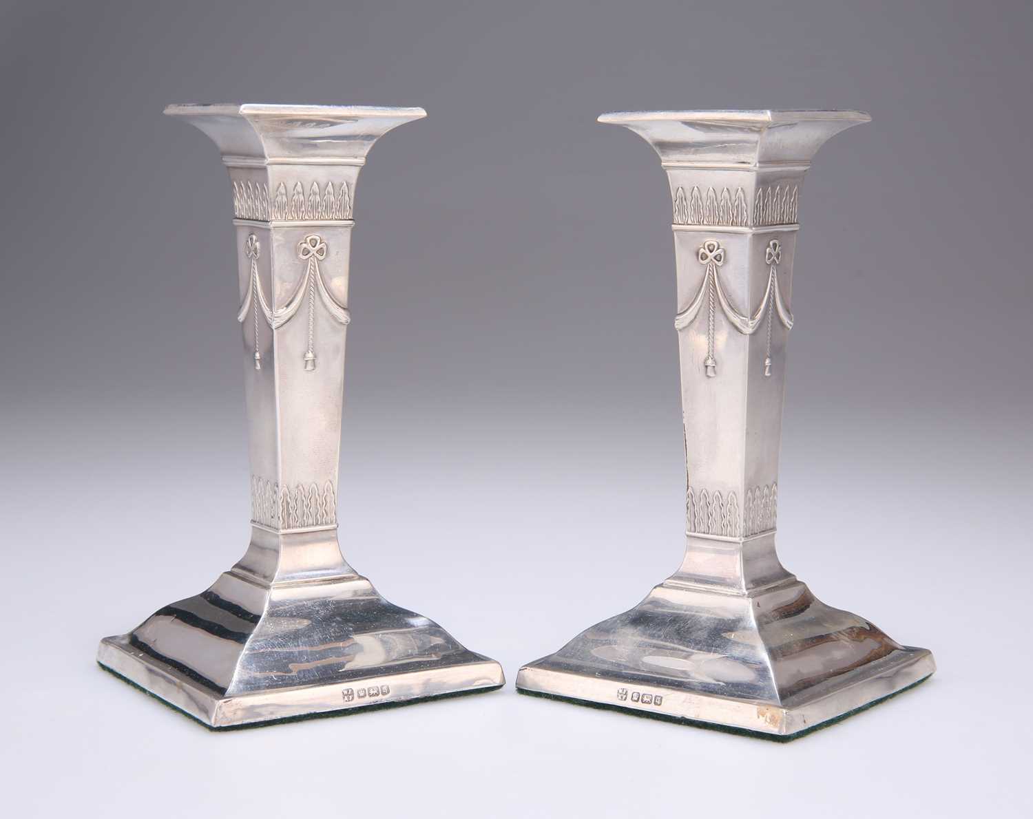 Lot 261 - A PAIR OF EDWARDIAN CANDLESTICKS