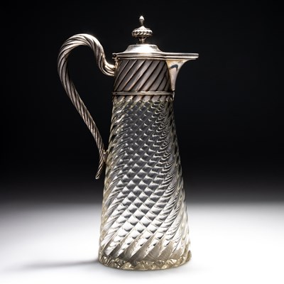 Lot 202 - AN AUSTRO-HUNGARIAN SILVER-MOUNTED CLARET JUG