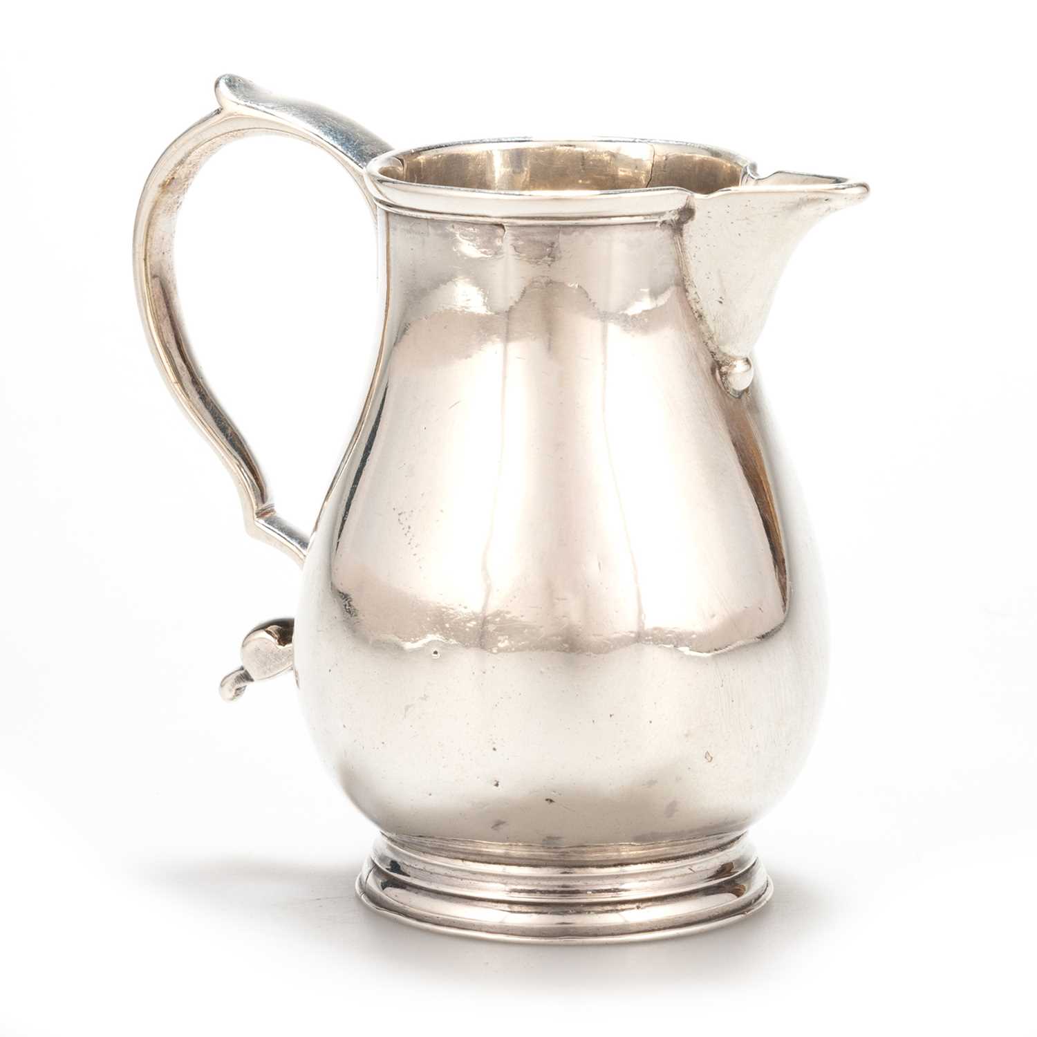 Lot 267 - A GEORGE II SILVER SPARROW-BEAK CREAM JUG