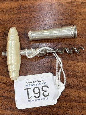 Lot 361 - A GEORGE III SILVER AND MOTHER-OF-PEARL POCKET CORKSCREW, CIRCA 1800