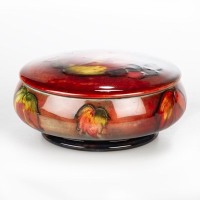 Lot 64 - A WILLIAM MOORCROFT FLAMBE POWDER JAR AND COVER