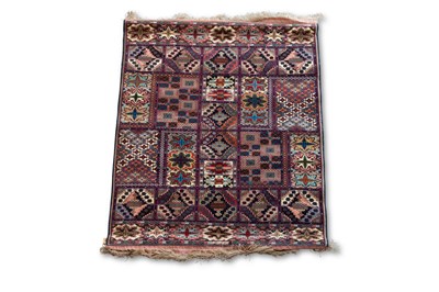 Lot 714 - A SILK AFGHAN CARPET