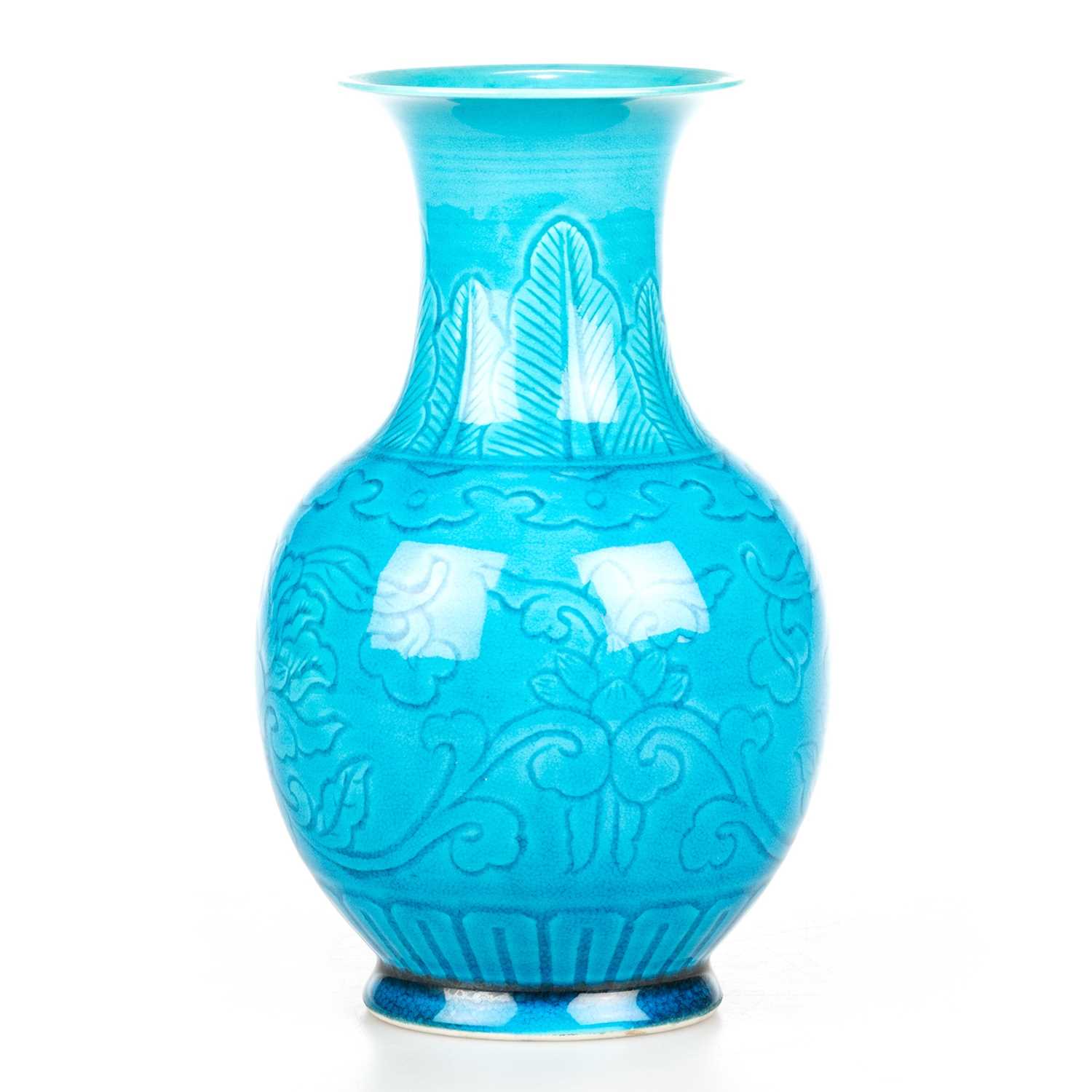 Lot 114 - A CHINESE TURQUOISE GLAZED SGRAFFITO DECORATED VASE