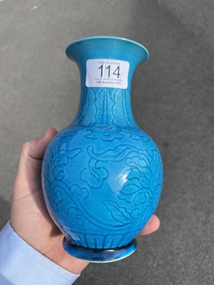 Lot 114 - A CHINESE TURQUOISE GLAZED SGRAFFITO DECORATED VASE