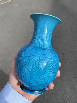 Lot 114 - A CHINESE TURQUOISE GLAZED SGRAFFITO DECORATED VASE