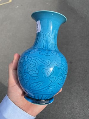 Lot 114 - A CHINESE TURQUOISE GLAZED SGRAFFITO DECORATED VASE