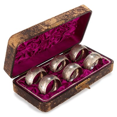 Lot 211 - A SET OF SIX VICTORIAN SILVER NAPKIN RINGS