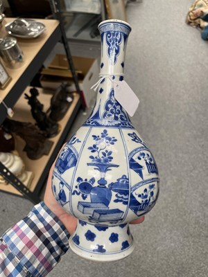 Lot 80 - TWO CHINESE BLUE AND WHITE PORCELAIN BOTTLE VASES, KANGXI PERIOD