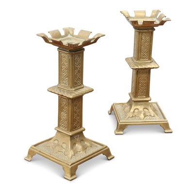 Lot 176 - A PAIR OF GOTHIC REVIVAL BRASS CANDLESTICKS, LATE 19TH CENTURY