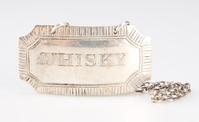 Lot 385 - AN ELIZABETH II SILVER WHISKY LABEL