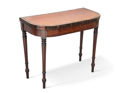 Lot 676 - A REGENCY MAHOGANY AND COROMANDEL FOLDOVER CARD TABLE