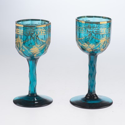 Lot 37 - A NEAR PAIR OF GILDED TURQUOISE BLUE WINE GLASSES, 18TH CENTURY