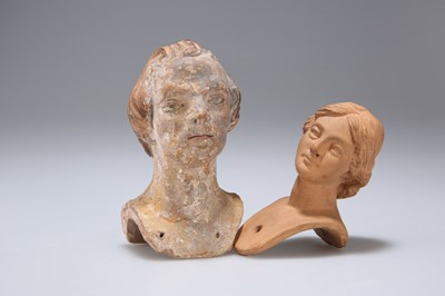 Lot 1062 - A TERRACOTTA HEAD OF A MAN