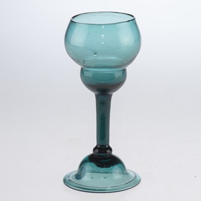 Lot 10 - A RARE PEACOCK BLUE WINE GLASS, 18TH CENTURY
