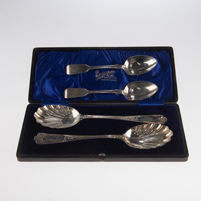 Lot 1119 - A PAIR OF EDWARDIAN SILVER SERVING SPOONS