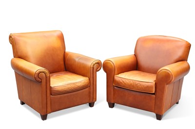 Lot 696 - TWO BROWN LEATHER UPHOLSTERED ARMCHAIRS