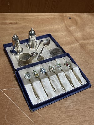 Lot 61 - A SET OF SILVER GILT AND ENAMEL TEASPOONS