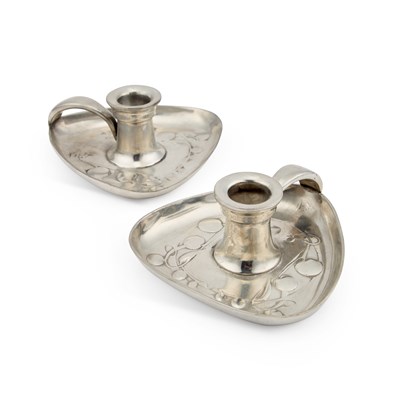 Lot 582 - ARCHIBALD KNOX (1864-1933) FOR LIBERTY & CO, A PAIR OF TUDRIC PEWTER CHAMBERSTICKS