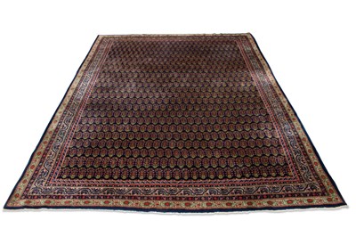 Lot 629 - A PERSIAN SAROQ CARPET