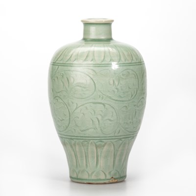Lot 94 - A CHINESE CARVED CELADON MEIPING