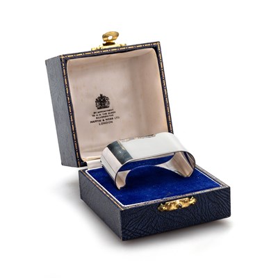 Lot 119 - AN ELIZABETH II SILVER NAPKIN RING