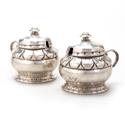 Lot 202 - GEORG JENSEN: A PAIR OF DANISH SILVER MUSTARD POTS